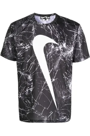 Comme des Garçons T-Shirt mit Swoosh-Print