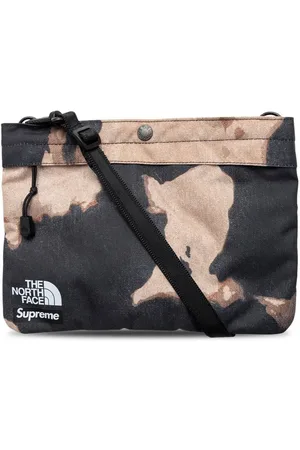 Supreme X TNF Schultertasche mit Bleach-Effekt