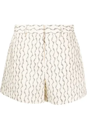 REMAIN Shorts mit abstraktem Print