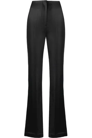 Nanushka Hose mit schmalem Bein