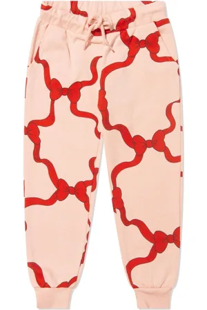 Mini Rodini Jogginghose aus Bio-Baumwolle mit Schleifen-Print