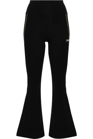 VERSACE Ausgestellte Leggings mit Logo-Applikation