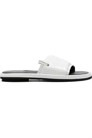 Premiata Pantoletten aus Lackleder