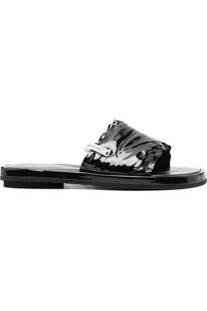 Premiata Pantoletten aus Lackleder