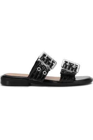 Ganni Flache Sandalen mit Schnalle