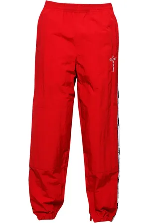 SAINT MXXXXXX Jogginghose mit Logo-Streifen