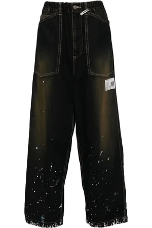 Maison Mihara Yasuhiro Weite Jeans mit Farbklecks-Print