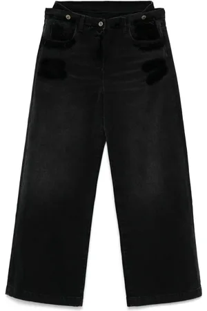 The Attico Jeans im Layering-Look
