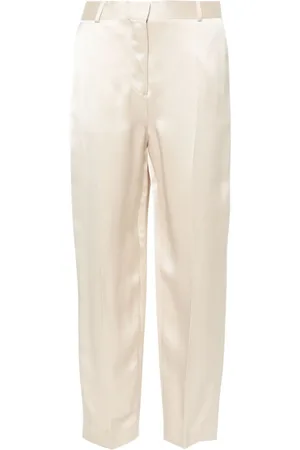 Totême Tief sitzende Hose aus Satin