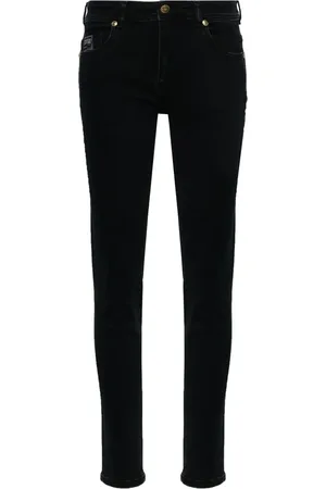 VERSACE Skinny-Jeans mit Logo-Schild