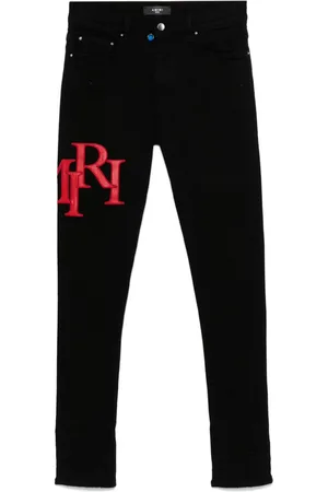 AMIRI Staggered Jeans mit Logo-Stickerei