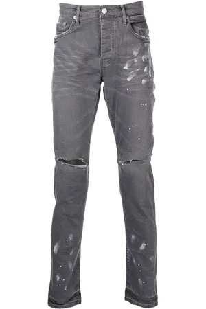 Purple Brand Schmale Distressed-Jeans mit Farbklecksen