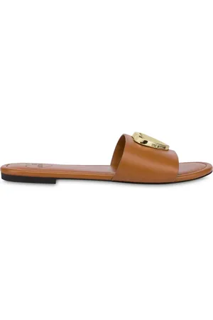 Moschino Pantoletten mit Logo-Schild