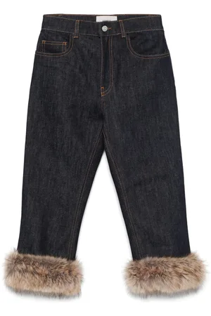 COPERNI Jeans mit Faux-Fur-Besatz
