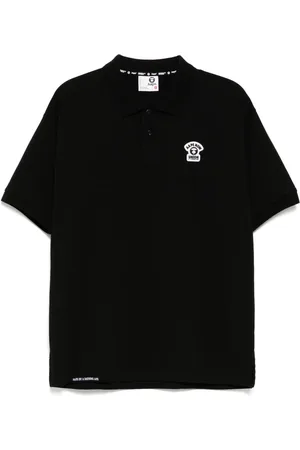 A Bathing Ape Poloshirt mit Moonface-Logo