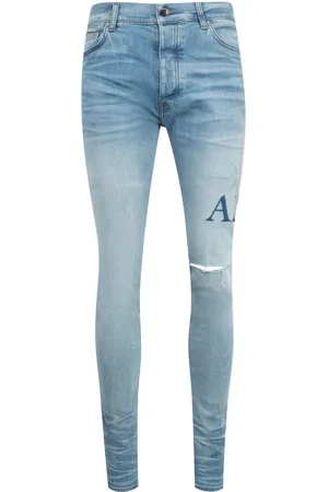 AMIRI Skinny-Jeans mit Starburst-Applikation