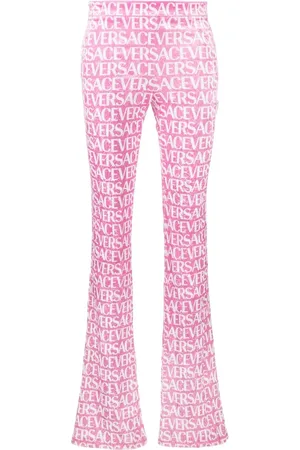 VERSACE Ausgestellte Hose mit Logo-Print