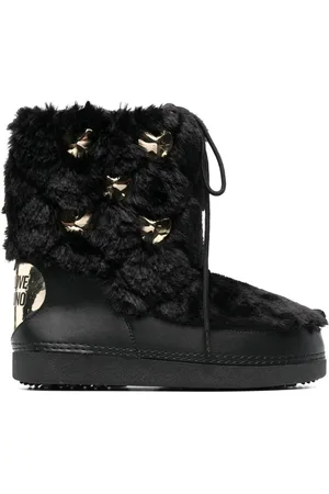 Moschino Stiefel aus Faux Fur mit Nieten