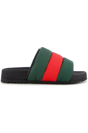 Gucci Wattierte Pantoletten mit Webstreifen