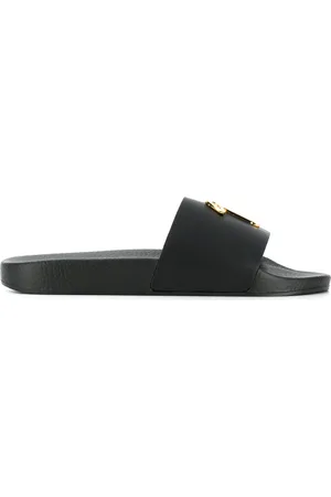 Giuseppe Zanotti Pantoletten mit Logo-Schild
