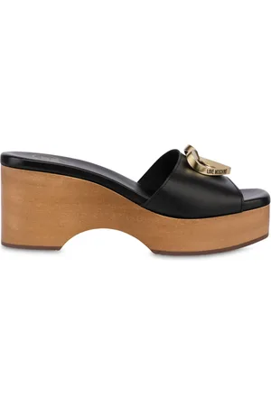Moschino Mules mit Logo-Schild