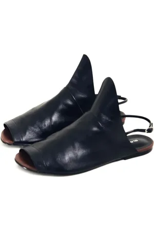 Gloria Coelho Flache Sandalen