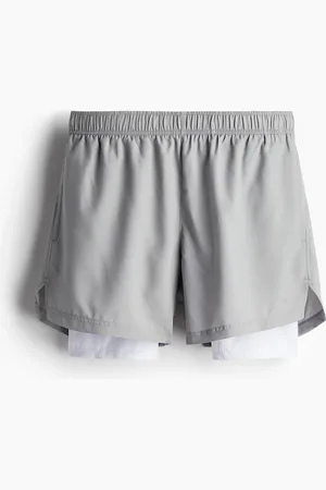 H&M Doppellagige Sportshorts mit DryMove™ - Grau