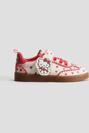 H&M Canvas-Sneaker mit Stickereien - Orange