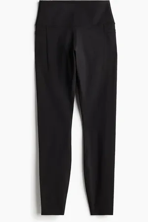 H&M Sportleggings mit DryMove™ und Beintaschen - Schwarz