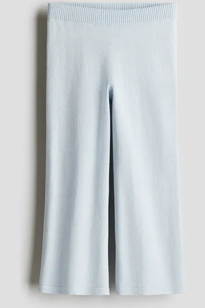 H&M Glitzernde Leggings aus Feinstrick - Blau