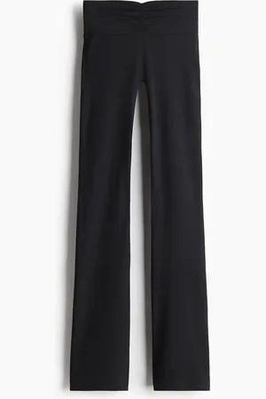 H&M Ausgestellte Yoga-Leggings mit SoftMove™ Lycra® - Schwarz