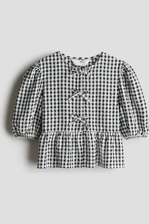 H&M Peplumbluse aus Baumwoll-Seersucker - Schwarz
