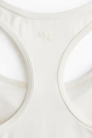 H&M Sport-BH mit SoftMove™ Medium Support - Weiß