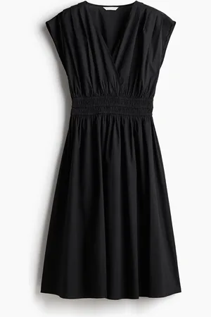 H&M Baumwollkleid mit gesmokter Taille - Schwarz