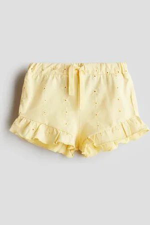 H&M Jerseyshorts mit Broderie Anglaise - Gelb