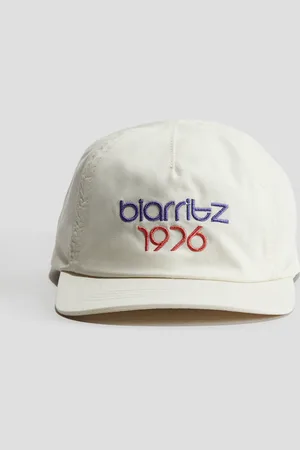 H&M Cap aus Baumwolltwill mit Motivstickerei - Weiß