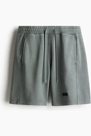 H&M Halblange Sportshorts - Grün
