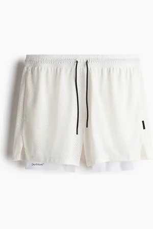 H&M Halblange 2-in-1-Sportshorts mit DryMove™ - Weiß