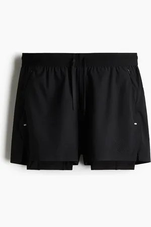 H&M Doppellagige Sportshorts mit DryMove™ - Schwarz