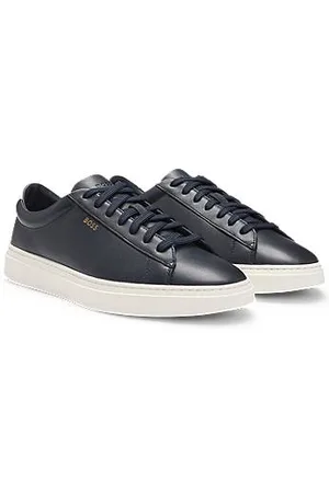HUGO BOSS Sneakers aus poliertem Leder mit Schnürung und Logo-Details