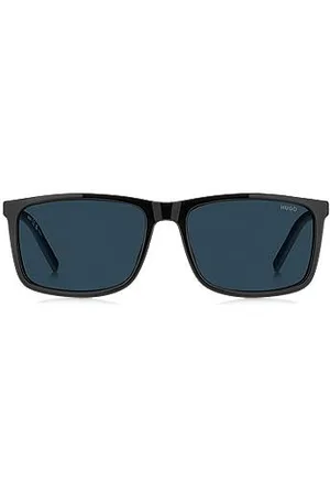 HUGO BOSS Schwarze Sonnenbrille mit blau getönten Gläsern