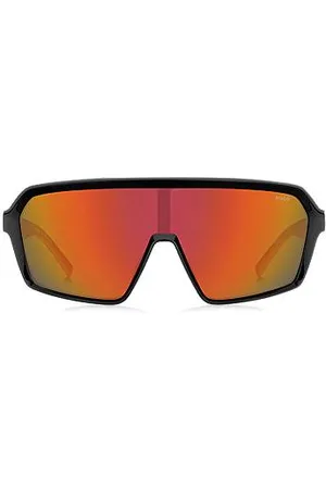 HUGO BOSS Sonnenbrille im Masken-Stil mit rot getönten Gläsern