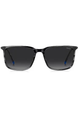 HUGO BOSS Graue Sonnenbrille aus gemustertem Acetat mit röhrenförmigen Metallbügeln
