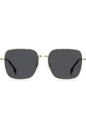 HUGO BOSS Goldfarbene Sonnenbrille mit charakteristischen Metalldetails