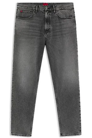 HUGO BOSS Tapered-Fit Jeans aus grauem Denim mit Used-Effekten
