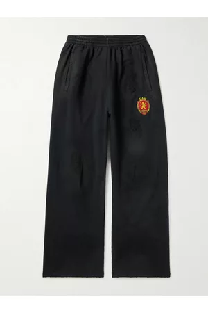 Balenciaga Weit geschnittene Jogginghose aus Baumwoll-Jersey mit Logoapplikation in Distressed-Optik - Men - - L