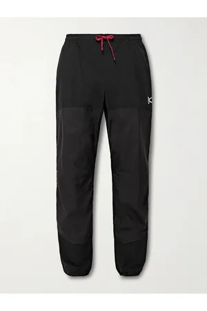 District Vision Zanzie schmal zulaufende Jogginghose aus recyceltem Shell mit Logoprint - Men - - M