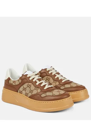Gucci Sneakers GG aus Canvas und Leder