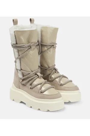 INUIKII Schneestiefel aus Leder mit Shearling