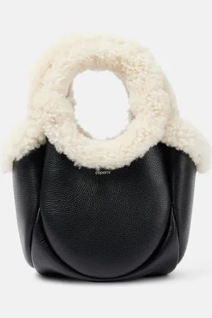 COPERNI Bucket-Bag Swipe Mini aus Leder mit Faux Fur